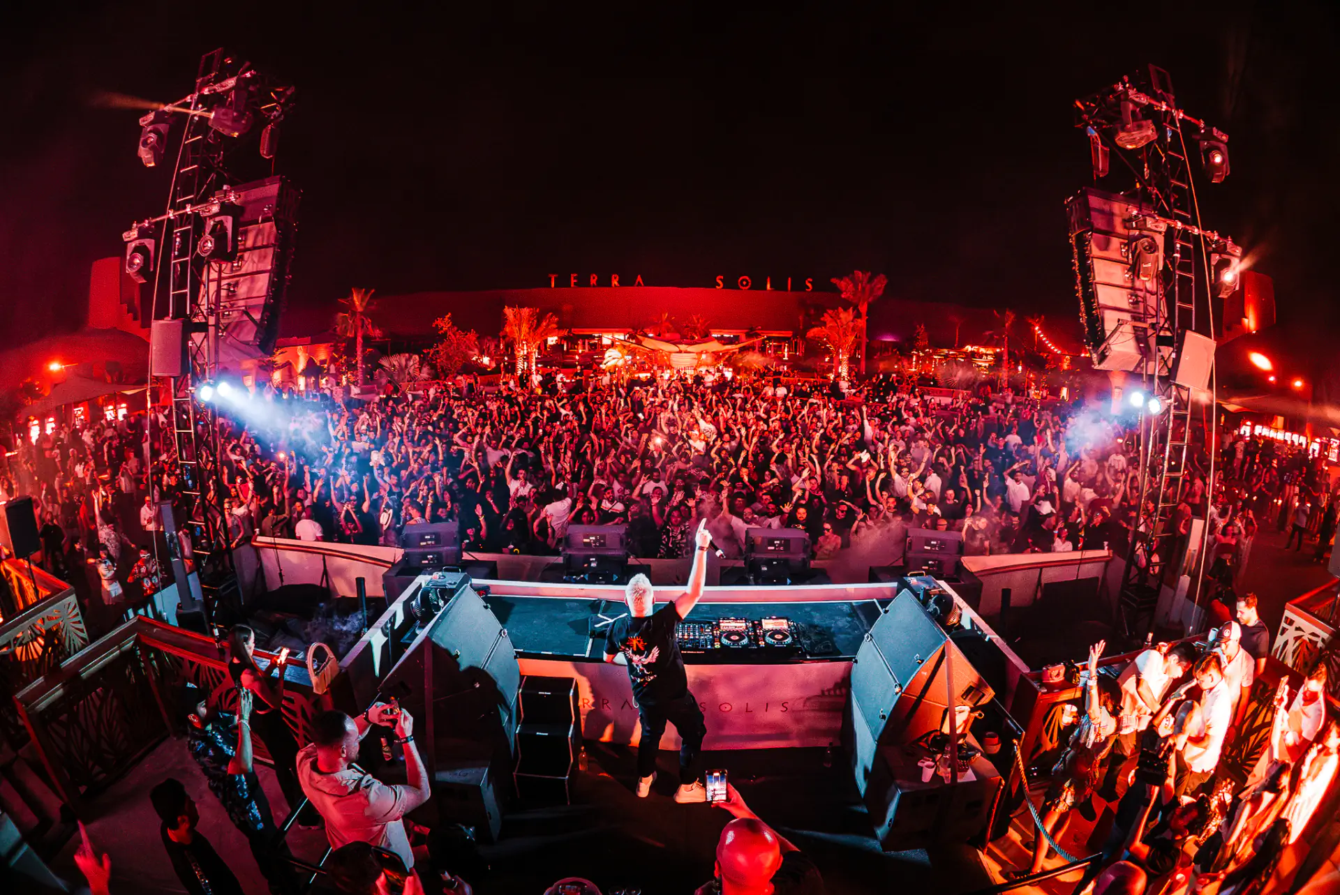 Scott Forshaw at Zero Gravity beach club under blue laser lighting